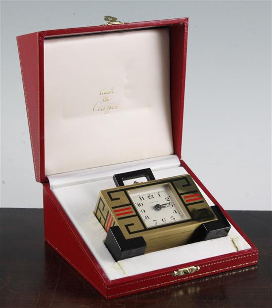 A Must de Cartier enamelled and lacquered brass desk timepiece, 4in., in original Cartier fitted case